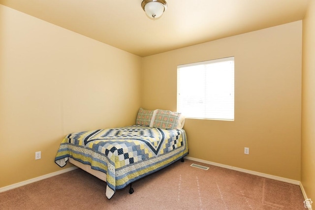 202 E Aparicio Dr, Tooele, UT 84074 - carpeted bedroom featuring baseboards and visible vents