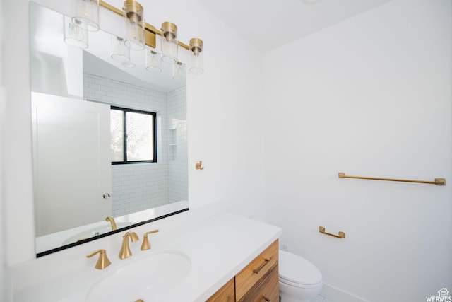 1154 Fawn, Pleasant View, UT 84414 - bathroom with baseboards, toilet, and vanity