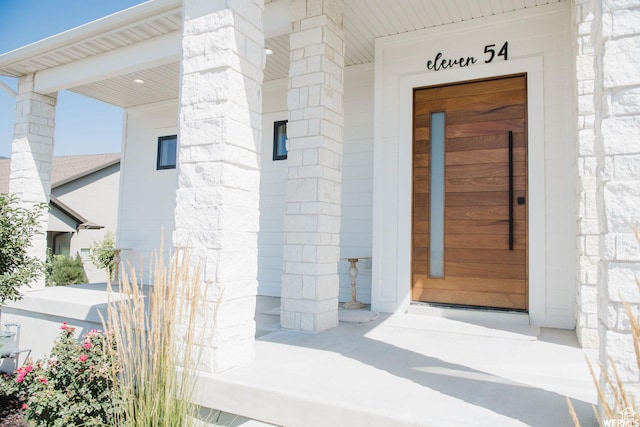 1154 Fawn, Pleasant View, UT 84414 - doorway to property with covered porch