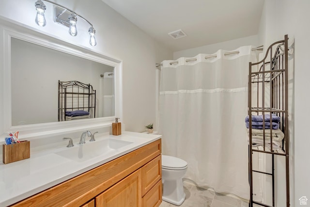 bathroom featuring visible vents, curtained shower, toilet, and vanity