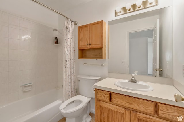 full bathroom featuring shower / bathtub combination with curtain, toilet, and vanity