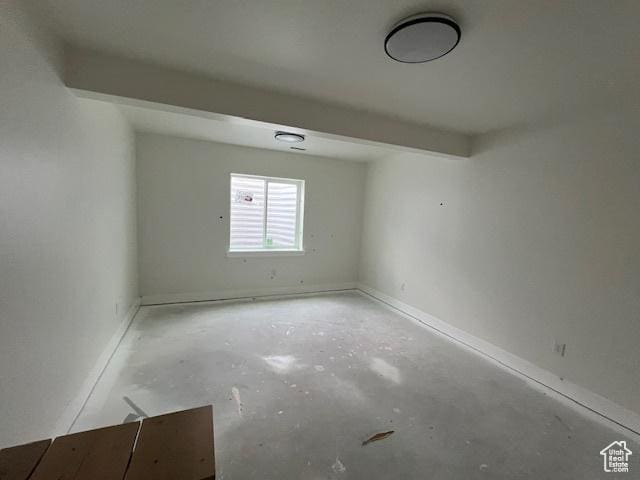 2131 N 725 W, Centerville, UT 84014 - spare room featuring unfinished concrete floors and baseboards