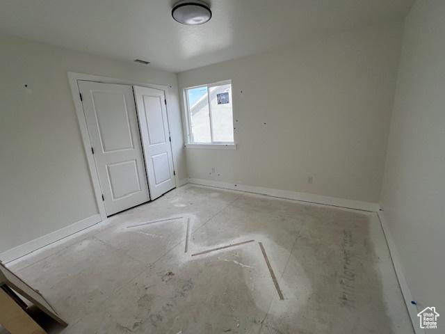 2131 N 725 W, Centerville, UT 84014 - unfurnished bedroom with a closet and baseboards