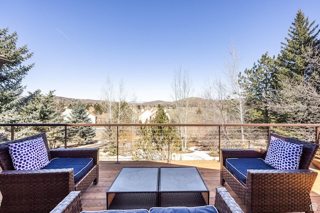 balcony featuring a mountain view