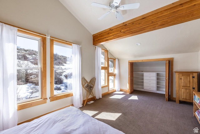 bedroom featuring baseboards, ceiling fan, carpet flooring, and lofted ceiling
