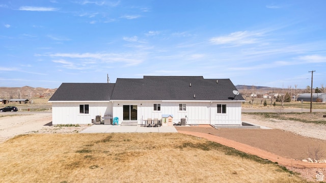 185 W 200 N, Centerfield, UT 84622 - rear view of house with board and batten siding and a patio area