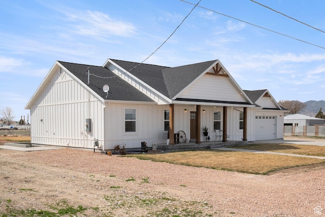 185 W 200 N, Centerfield, UT 84622 - modern farmhouse with a garage, concrete driveway, board and batten siding, a shingled roof, and a porch