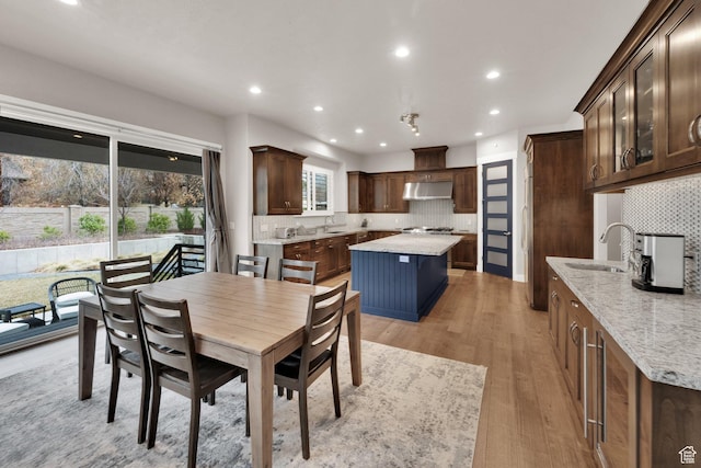 8165 S Willow Creek Cv E, Cottonwood Heights, UT 84093 - dining room featuring light wood finished floors and recessed lighting