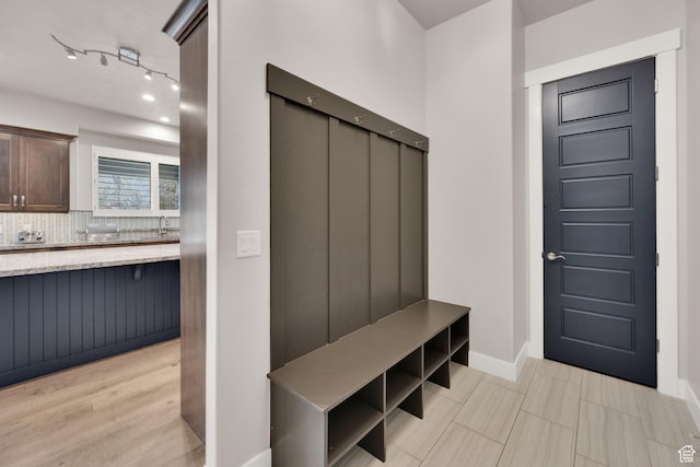 8165 S Willow Creek Cv E, Cottonwood Heights, UT 84093 - mudroom with baseboards