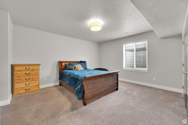 8165 S Willow Creek Cv E, Cottonwood Heights, UT 84093 - carpeted bedroom featuring baseboards