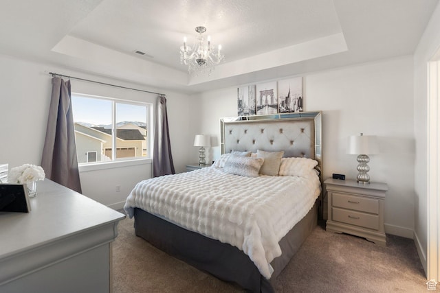 585 W 20 N, Hyrum, UT 84319 - bedroom featuring visible vents, carpet, baseboards, a raised ceiling, and an inviting chandelier