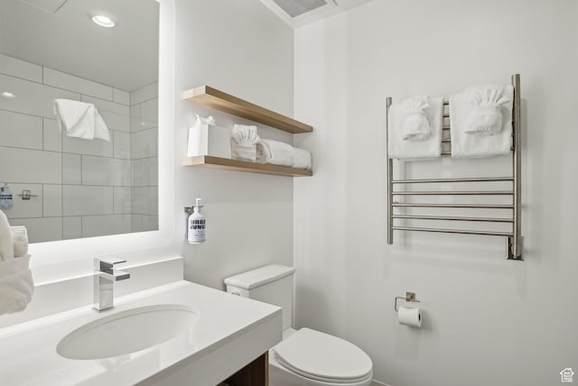 2670 Canyons Resort Dr Unit 424, Park City, UT 84098 - bathroom featuring radiator, toilet, vanity, and recessed lighting