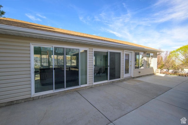 rear view of property with a patio area