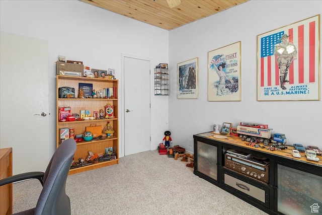 carpeted office featuring wooden ceiling