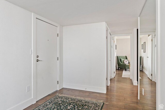 241 N Vine St Unit 606E, Salt Lake City, UT 84103 - entryway featuring baseboards and wood finished floors