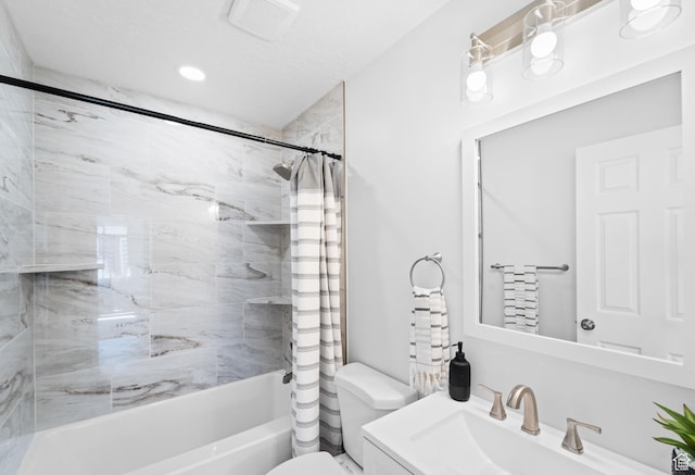 full bath featuring visible vents, shower / bathtub combination with curtain, toilet, and vanity