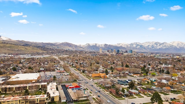 birds eye view of property with a mountain view