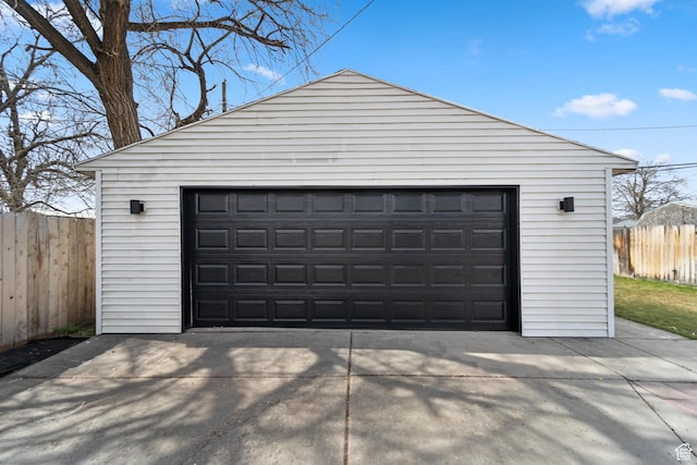 detached garage with fence