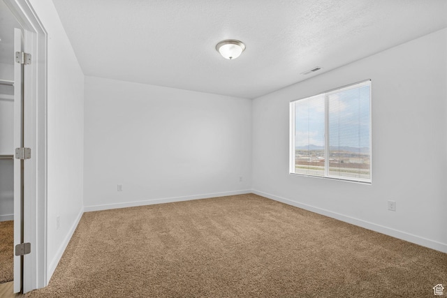 866 S Brubaker Way, Santaquin, UT 84655 - carpeted empty room featuring baseboards and a textured ceiling