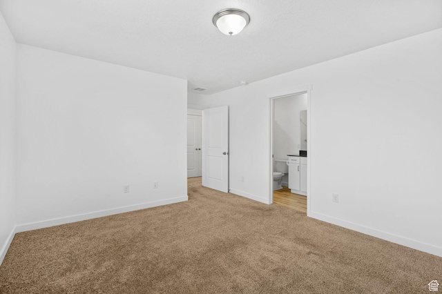 866 S Brubaker Way, Santaquin, UT 84655 - unfurnished bedroom featuring light colored carpet and ensuite bath
