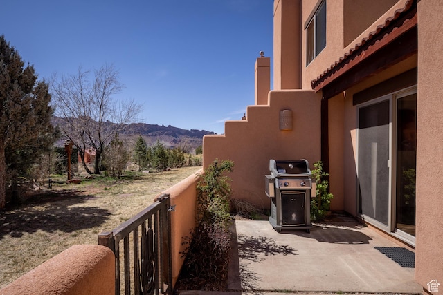 3418 E La Camino, Moab, UT 84532 - view of patio featuring a mountain view and grilling area