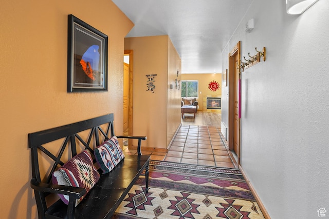 3418 E La Camino, Moab, UT 84532 - hallway with baseboards, visible vents, and tile patterned flooring