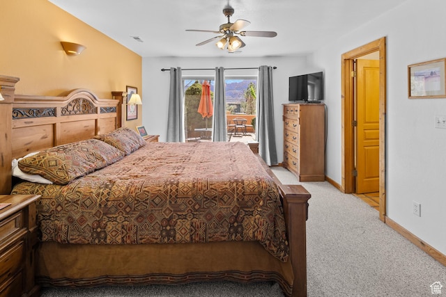 3418 E La Camino, Moab, UT 84532 - bedroom featuring visible vents, baseboards, access to outside, a ceiling fan, and light carpet