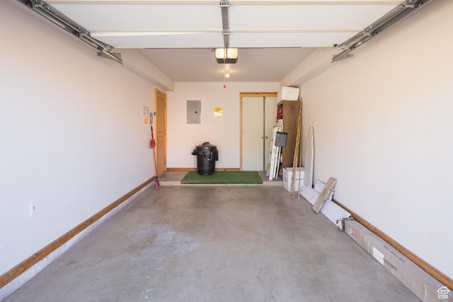 3418 E La Camino, Moab, UT 84532 - garage featuring baseboards and electric panel