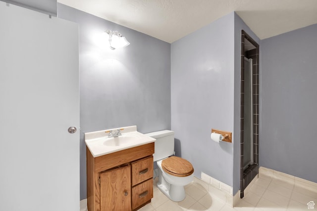 276 N 1100 E, Springville, UT 84663 - bathroom featuring a shower, toilet, vanity, and tile patterned flooring