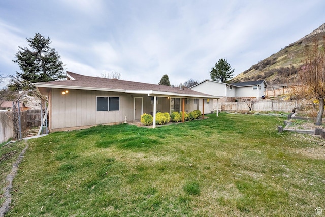 276 N 1100 E, Springville, UT 84663 - rear view of house featuring a fenced backyard and a yard
