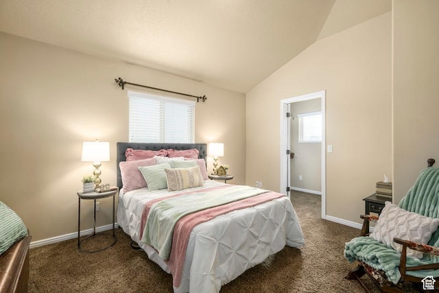 bedroom with baseboards, carpet, and lofted ceiling