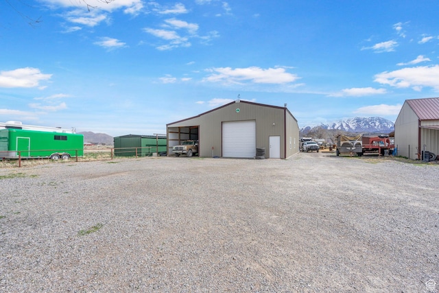 270 N 100 W, Goshen, UT 84633 - view of pole building with a mountain view, fence, and gravel driveway