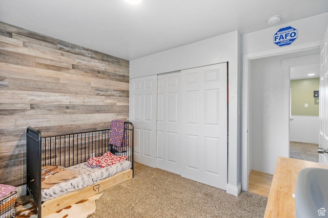 270 N 100 W, Goshen, UT 84633 - bedroom with a sink, a closet, wood walls, and carpet flooring
