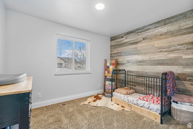 270 N 100 W, Goshen, UT 84633 - carpeted bedroom featuring baseboards, visible vents, and wooden walls