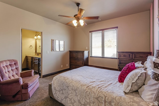 428 N Northstar Dr, St George, UT 84770 - carpeted bedroom with ensuite bath, a ceiling fan, baseboards, and a sink
