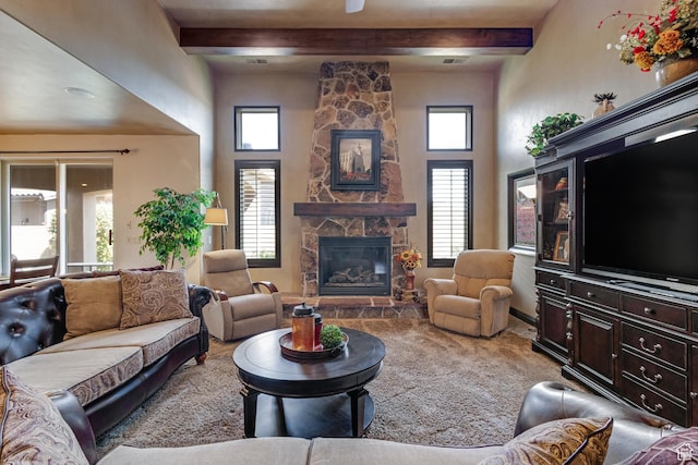 428 N Northstar Dr, St George, UT 84770 - carpeted living area featuring beamed ceiling, a stone fireplace, visible vents, and a towering ceiling