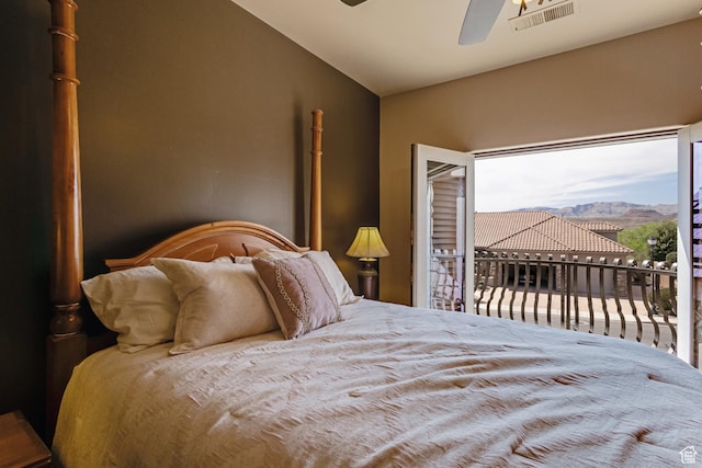 428 N Northstar Dr, St George, UT 84770 - bedroom featuring a mountain view, visible vents, lofted ceiling, access to outside, and ceiling fan