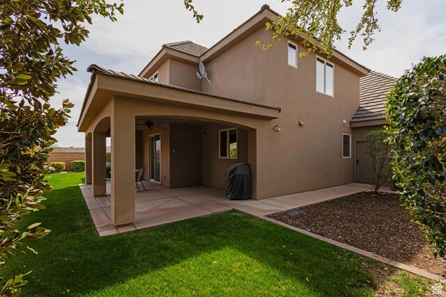 428 N Northstar Dr, St George, UT 84770 - rear view of property with stucco siding, a yard, a patio, and ceiling fan