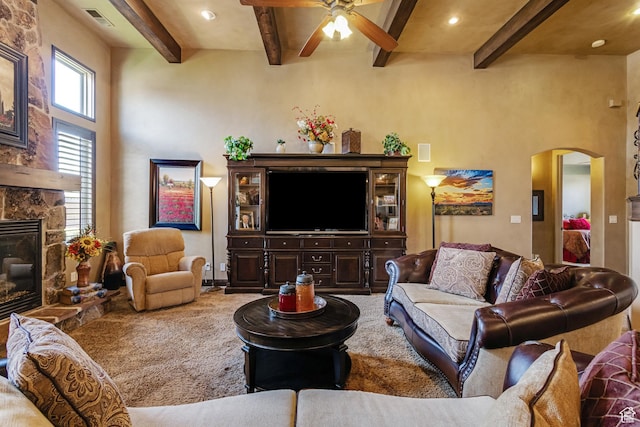 428 N Northstar Dr, St George, UT 84770 - living room with a high ceiling, visible vents, arched walkways, and ceiling fan