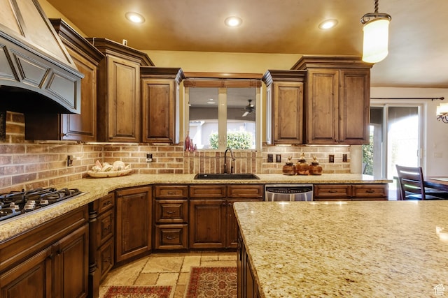 428 N Northstar Dr, St George, UT 84770 - kitchen featuring a wealth of natural light, stainless steel dishwasher, custom exhaust hood, and a sink