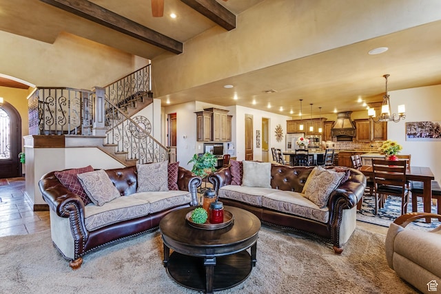 428 N Northstar Dr, St George, UT 84770 - living area featuring stairway, an inviting chandelier, beamed ceiling, a high ceiling, and recessed lighting