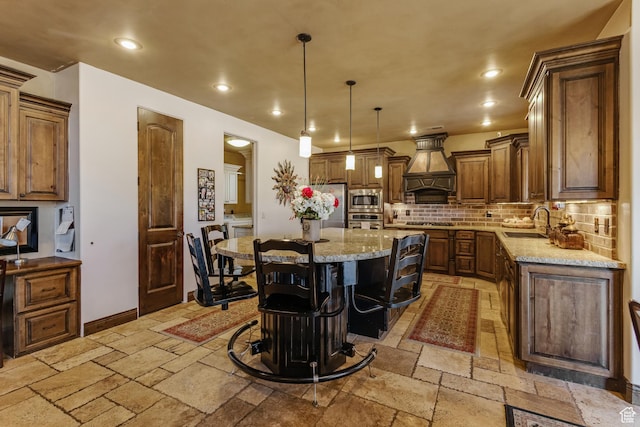 428 N Northstar Dr, St George, UT 84770 - kitchen with stone tile flooring, a sink, appliances with stainless steel finishes, and premium range hood