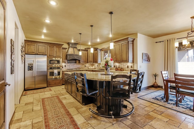 428 N Northstar Dr, St George, UT 84770 - kitchen with stone tile floors, light stone counters, baseboards, tasteful backsplash, and appliances with stainless steel finishes