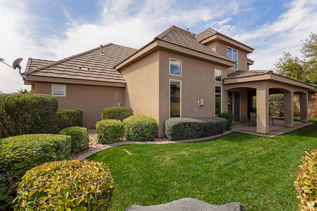 428 N Northstar Dr, St George, UT 84770 - rear view of property with a yard, a patio area, and stucco siding