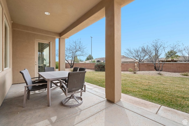 2653 Rio Lobo Dr, St George, UT 84770 - view of patio with a fenced backyard and outdoor dining area