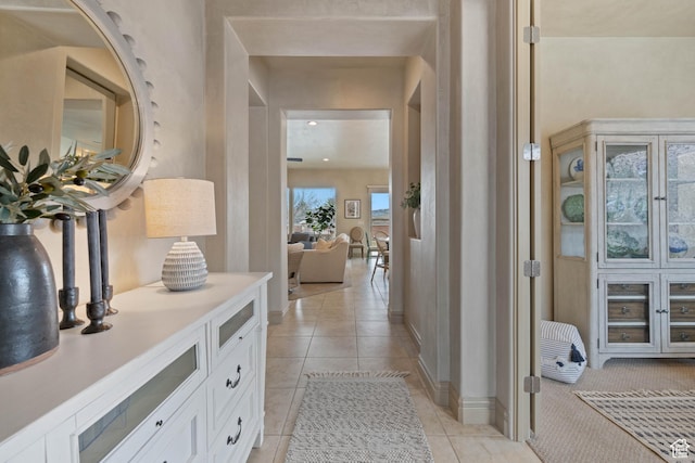 2653 Rio Lobo Dr, St George, UT 84770 - hall featuring light tile patterned floors and baseboards