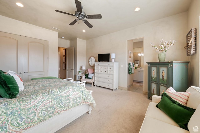 2653 Rio Lobo Dr, St George, UT 84770 - bedroom with light carpet, ensuite bath, baseboards, ceiling fan, and recessed lighting