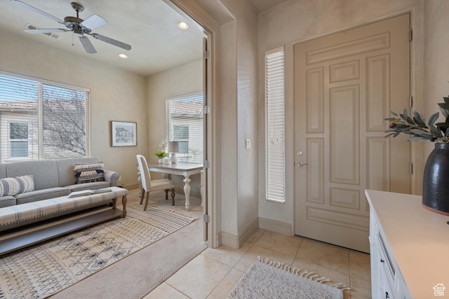 2653 Rio Lobo Dr, St George, UT 84770 - entryway featuring a ceiling fan, light tile patterned floors, a healthy amount of sunlight, and recessed lighting