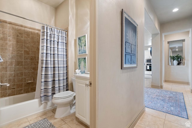 2653 Rio Lobo Dr, St George, UT 84770 - bathroom featuring baseboards, toilet, vanity, shower / bath combo with shower curtain, and tile patterned flooring