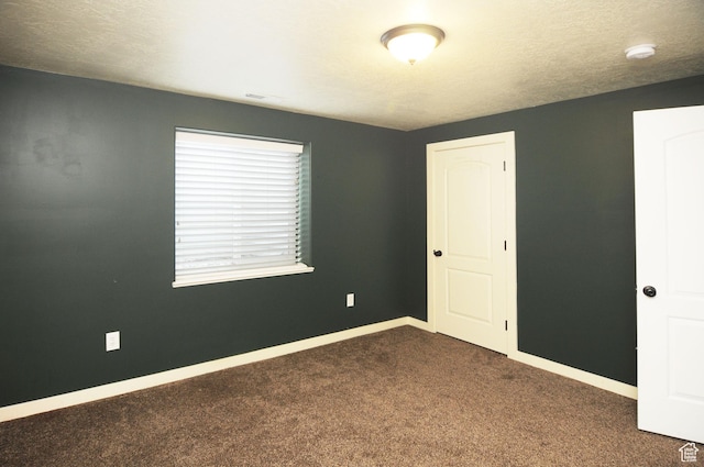 245 E 660 S, Willard, UT 84340 - unfurnished bedroom with dark carpet and baseboards